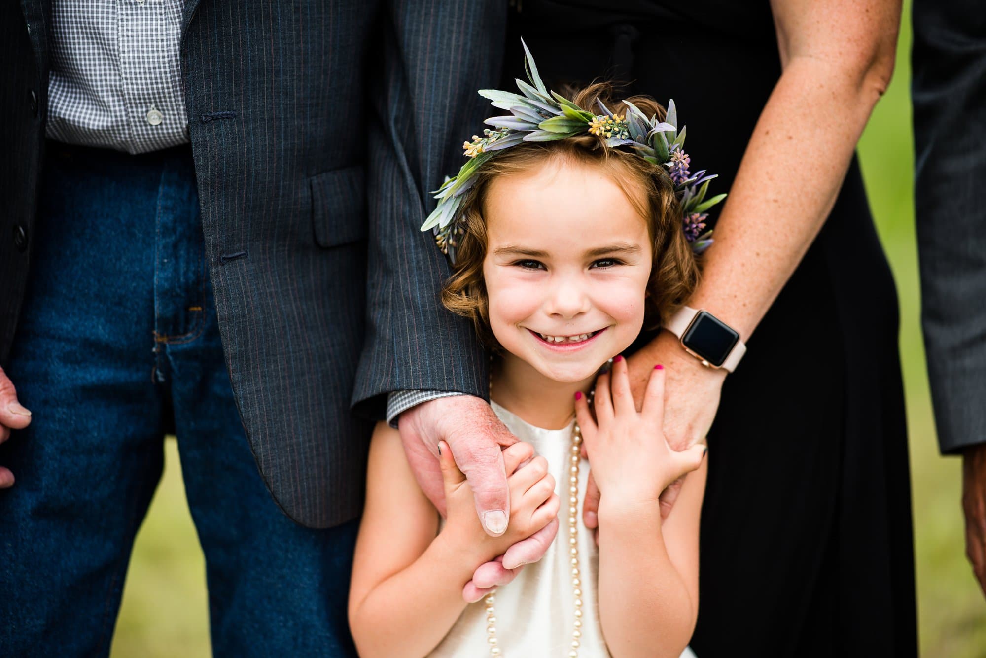 flower girl during family photos