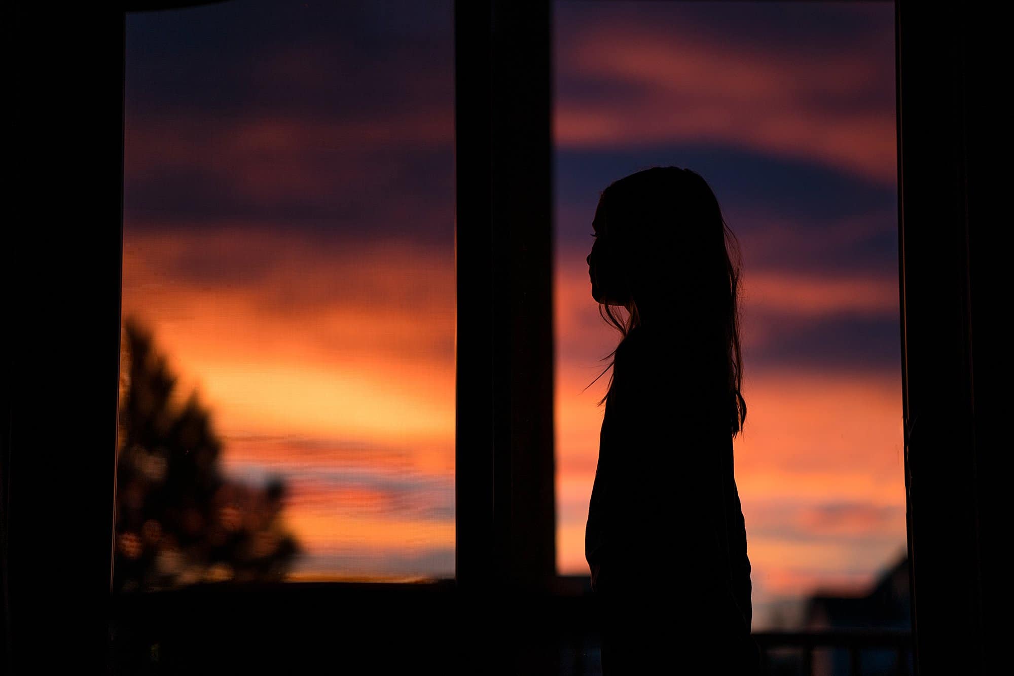 sunrise, little girl looking out window