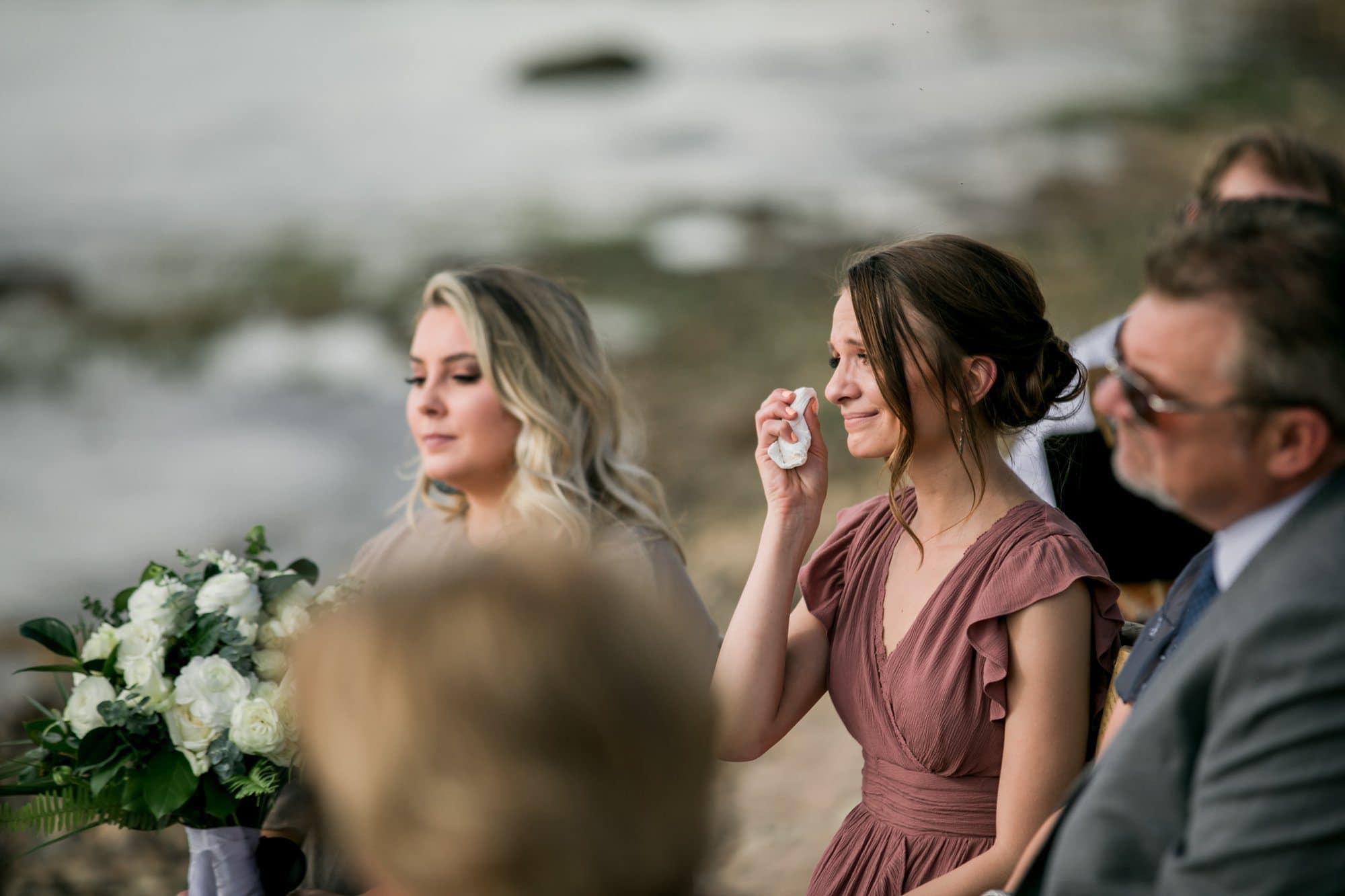 bride's sister crying during ceremony