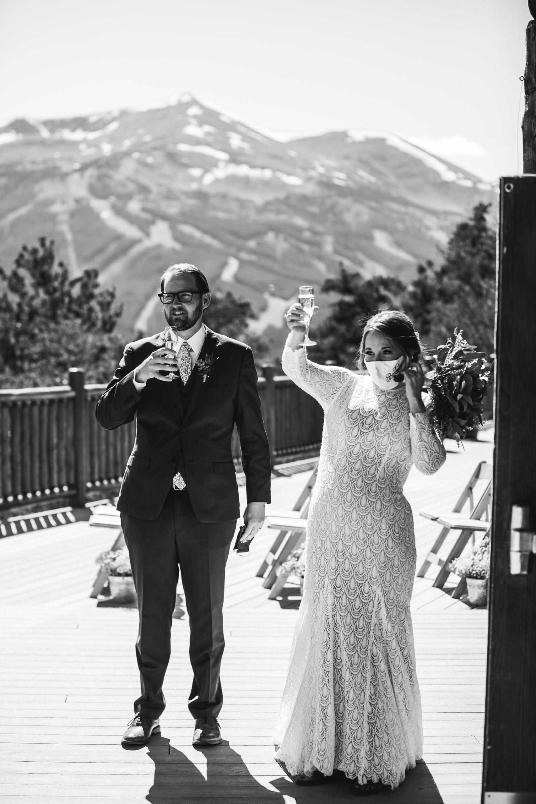 Bride with mask during toast