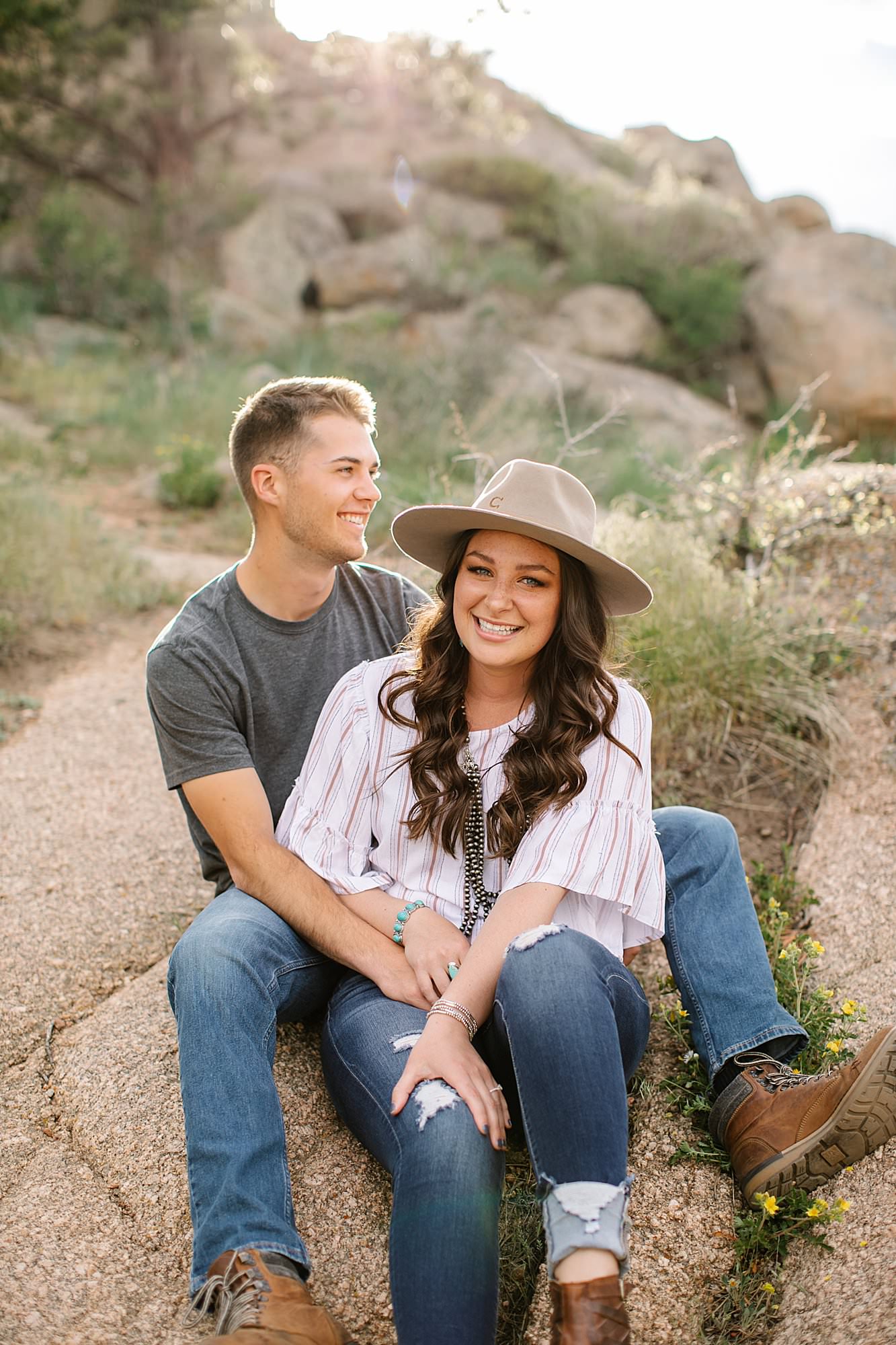 couple with hat engagement session