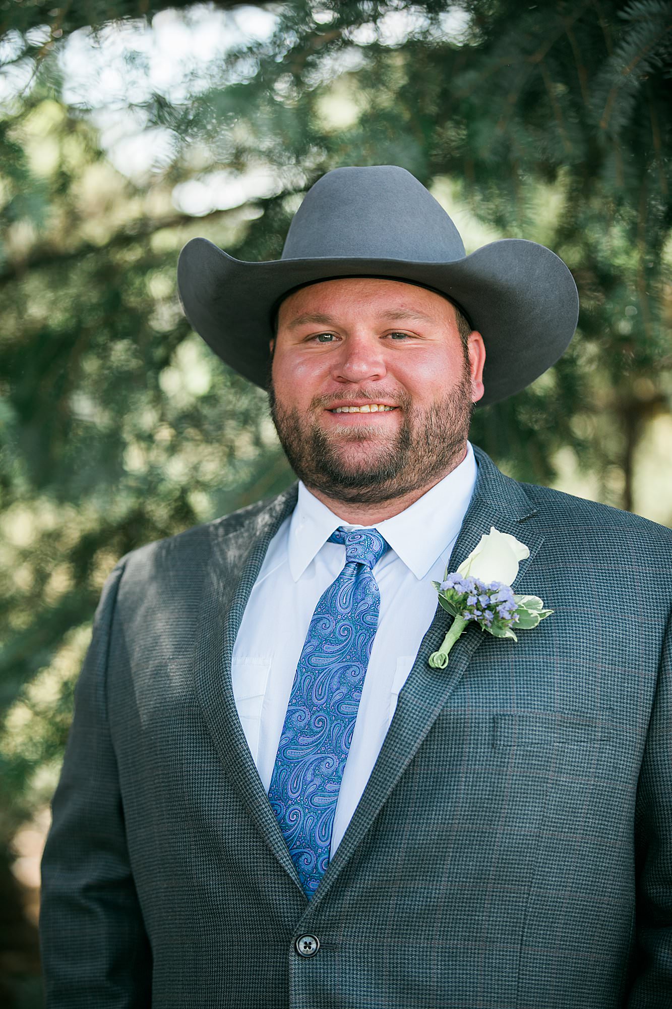 cowboy groom on wedding day