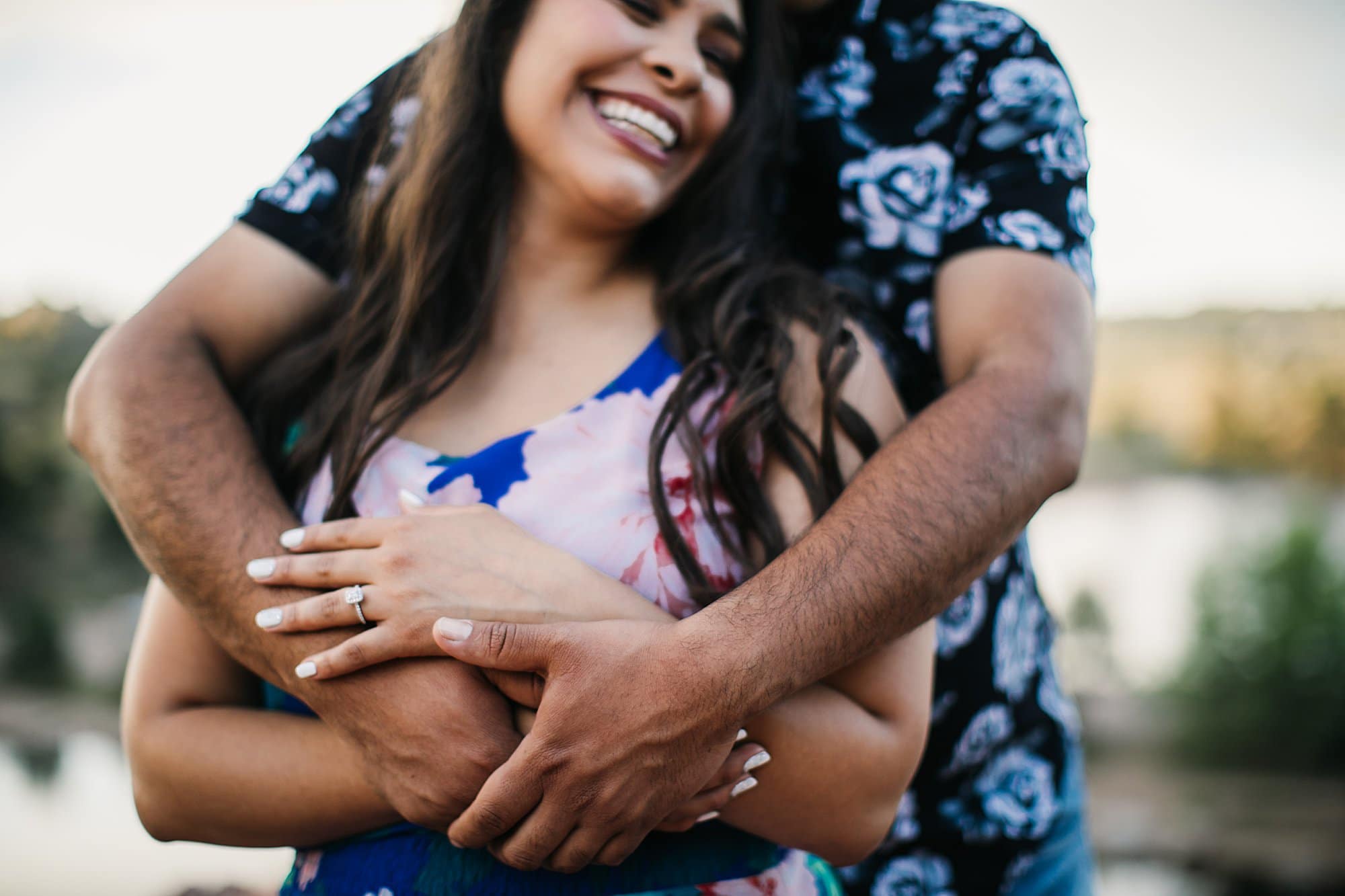 hands, laughing photo at engagement session